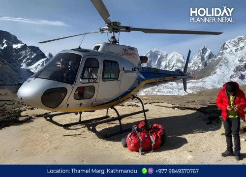 Helicopter landing at Kalapatthar viewpoint near Everest Base Camp