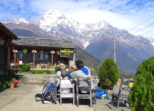 Guest enjoying view of Annapurna Mountain from Luxury lodge